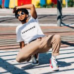 Black man leaning back